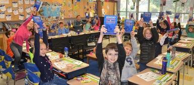 Skaneateles Rotary Presents Dictionary & Thesaurus to Third Grade